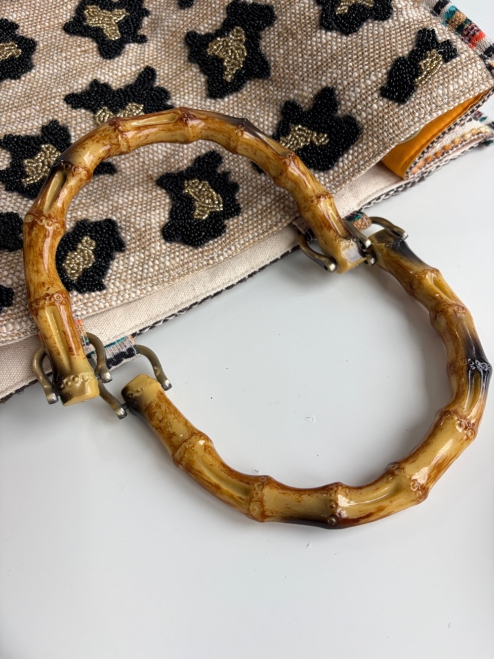 America & Beyond Luxe Leopard Tote Bag
Beaded Bamboo Handles Beige/Black/Orange - Picture 16 of 17